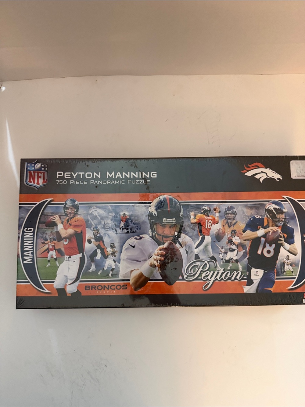 NFL Peyton Manning 750 piece Panoramic Puzzle - Orange, Blue